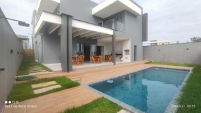 Excelente casa de praia 4 suítes em condomínio
